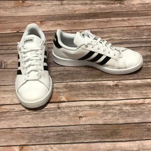 Adidas Originals Black and White men’s sz 10